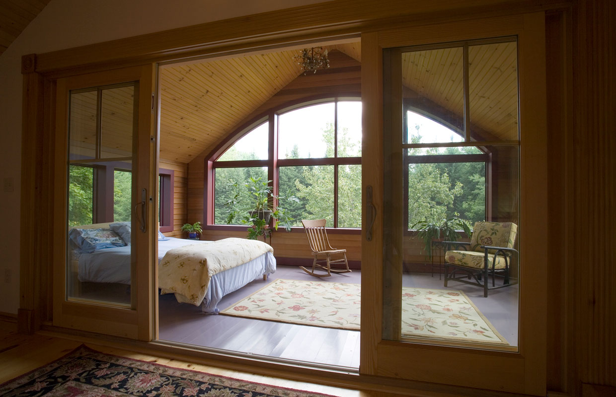 large bedroom with big windows